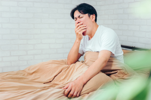 睡眠不足の男性